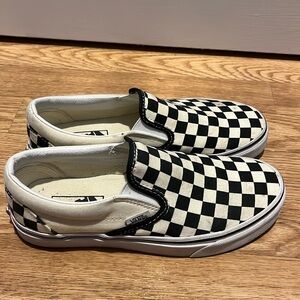 Black and white checkered Vans, men’s 5.5, women’s 7